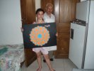 My 10 year old niece Anastasia with
	her Penrose Tesselation (and my father)